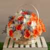 Arrangement Of White Chrysanthemums And Orange Roses In A Baskets