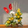 Arrangement Of Yellow Roses ,White Chrysanthemums ,Anthroniums And Dry Sticks In A Basket