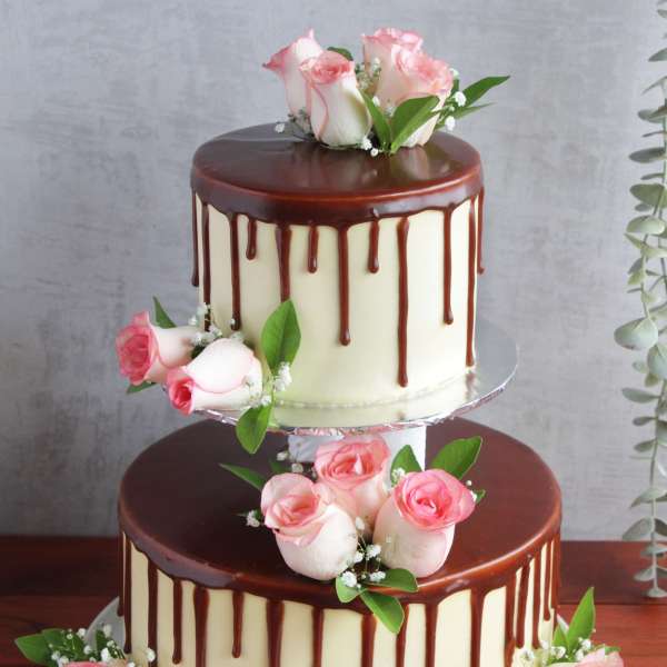 Chocolate Frosting Two Tier Cake With Fresh Flowers Eggless 3kg