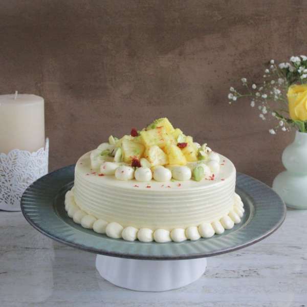 Pineapple French Buttercream Cake eggless