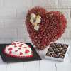 White And Red Heart Shape Dutch Truffle With Heart Shape Chocolate Pralines And Red Heart Shape Flower Arrangements